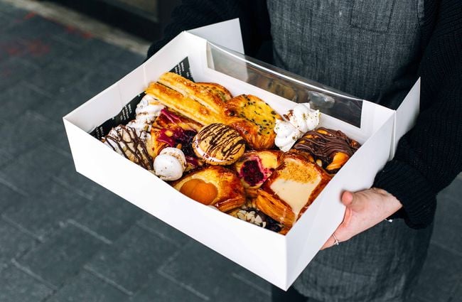 Close up of pastries in a box.