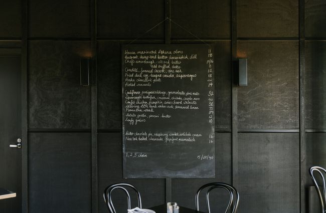Blackboard menu hanging on the wall at Black Estate, North Canterbury.
