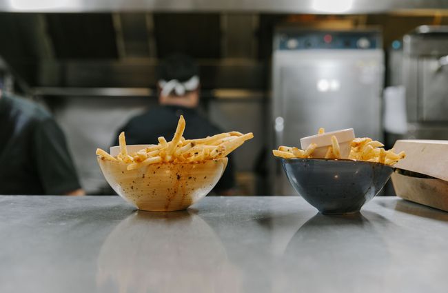Bowls of fries on the pass at Blue Lake Eatery and Bar, Tekapo.