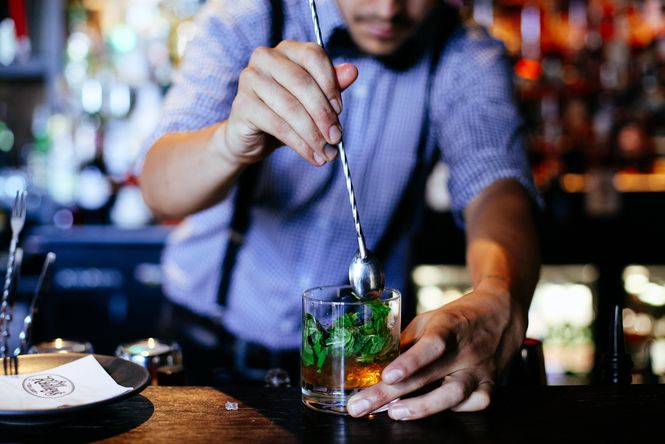 A cocktail being made by a bar man at Boo Radley's in Christchurch.