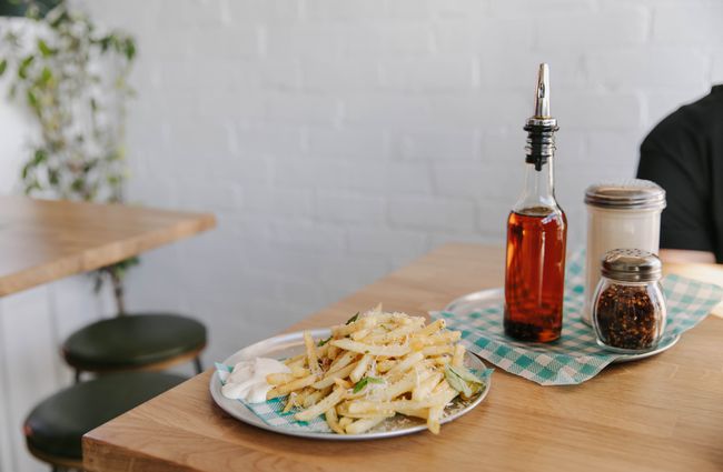 Chips and chilli oil on a table at Bottle and Stone in Christchurch.