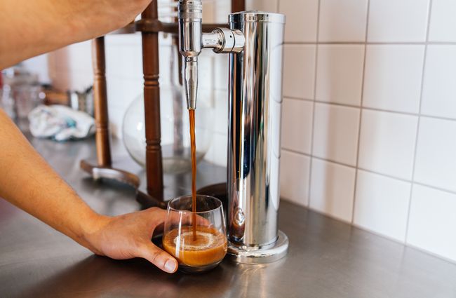 Nitro coffee being poured at Coffee Embassy.