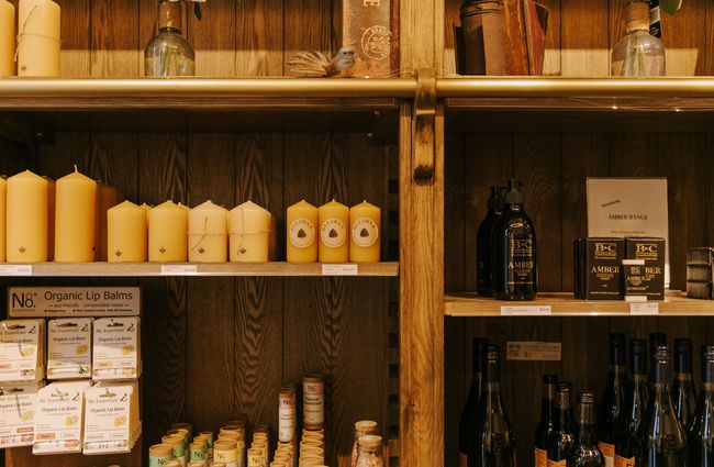 Beeswax candles and other goods on the shelves at Colony, Christchurch.