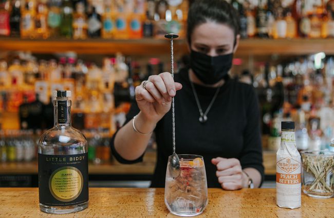Bartender making a gin cocktail at Cork, Wānaka.