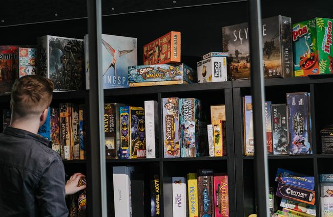 Shelves of board games at Dice and Slice in Christchurch.