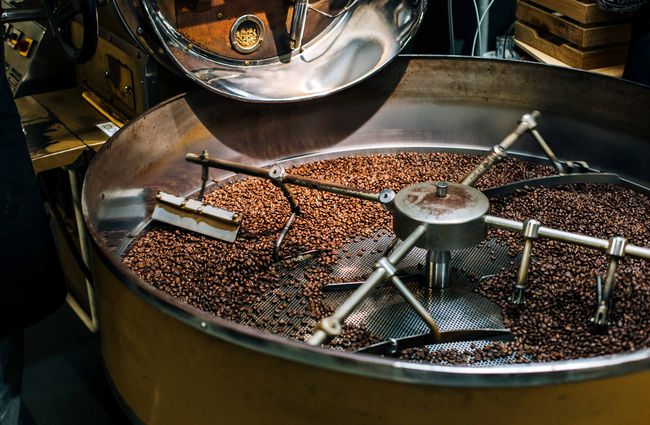 Close up of coffee beans being roasted.