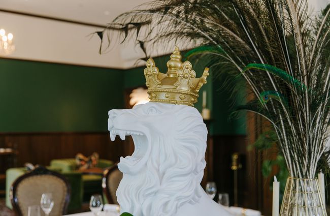 Lion statue with gold crown at Eliza's Manor, Christchurch.