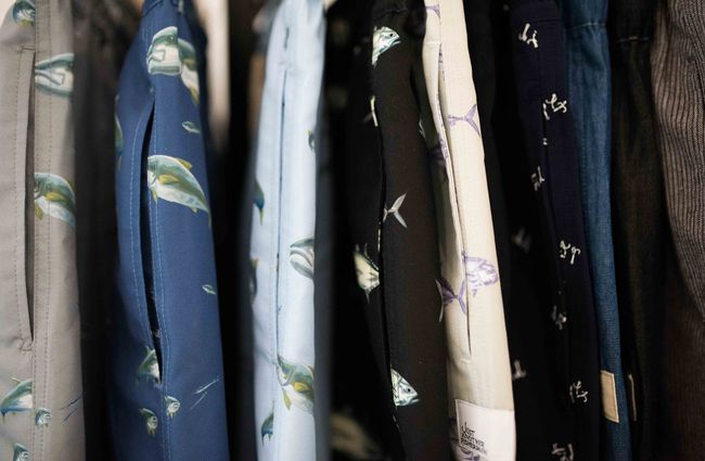 Close up of clothing with fish patterns.