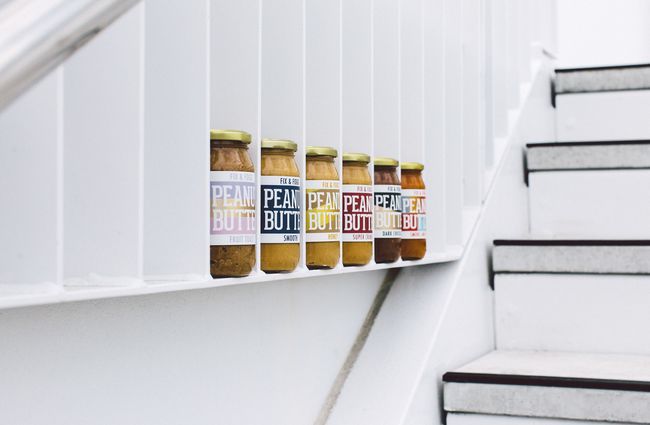 Peanut butter lined up against a wall at Fix and Fogg Wellington.
