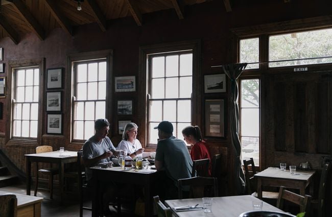 Diners at a table at Fleurs Place in Moeraki.
