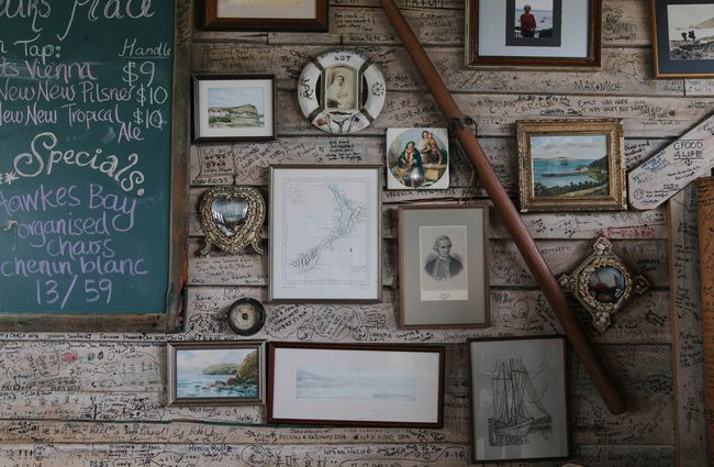 Framed pictures on the wall at Fleurs Place in Moeraki.