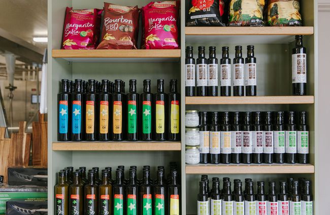 Shelves of different oils for sale at Geraldine Cheese Company.