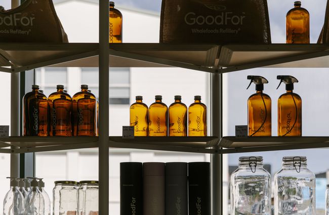 Window display with reusable cleaning bottles at GoodFor in Christchurch.
