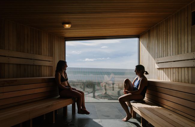 Two friends in the sauna at He Puna Taimoana.