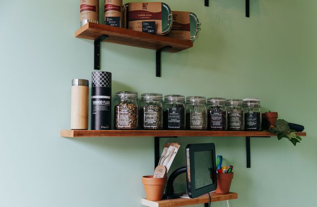 Herbal teas on display on a shelf.