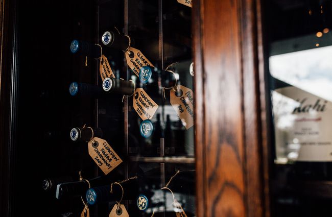 Wine in a cupboard cellar inside Inati restaurant Christchurch, New Zealand.