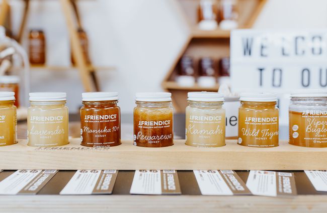 Jars of honey in a row at J Friend & Co Honey, Christchurch