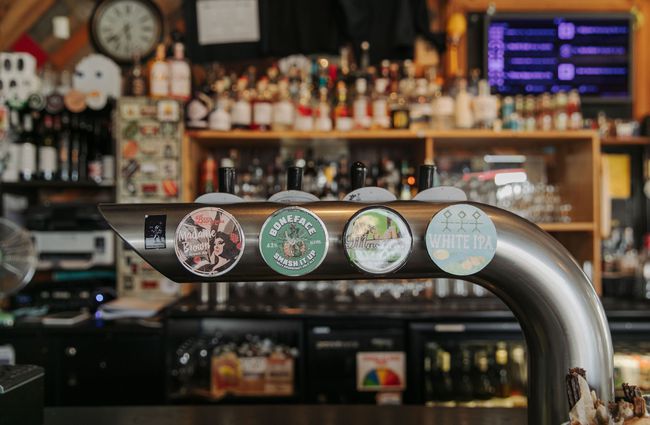 Close up of beer taps at Moon Under Water, Christchurch.