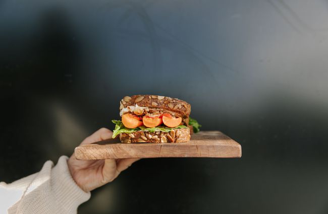 Close up of a sandwich on a wooden board from Native Cafe.