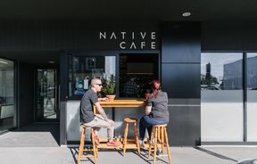 Customers sat on stools outside Native cafe.