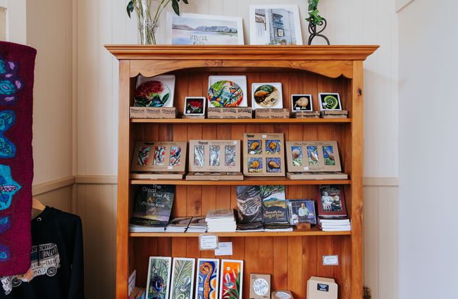 Kiwiana cards and posters on display.