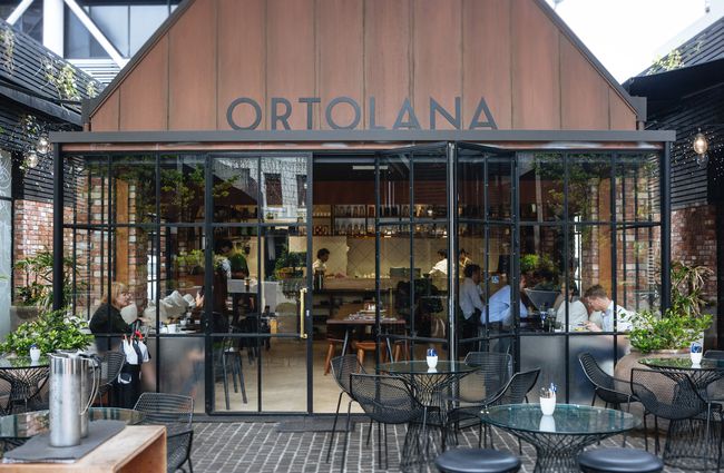 Exterior front sign of Ortolana.