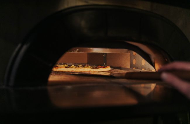 Pizza inside the oven.