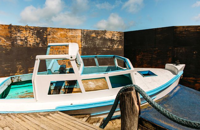 A blue and white boat on display outside at Punnet Eatery.