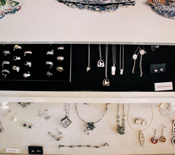 Jewellery in display cabinets.
