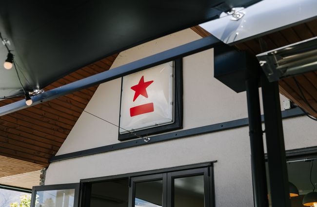 Exterior sign for Red Star Burgers.