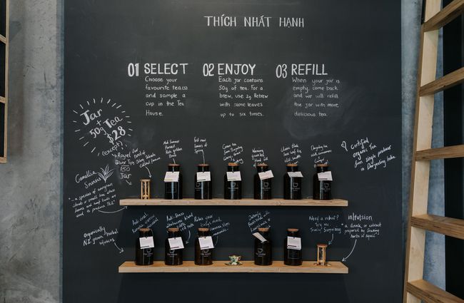 Tea menu written on a blackboard.