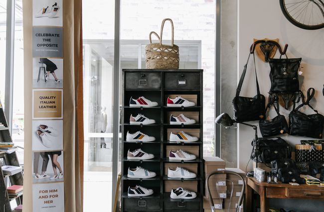Trainers on shelving unit.