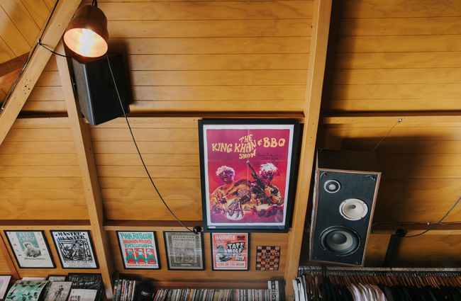 Old music poster framed on the wall at Ride On Super Sound.
