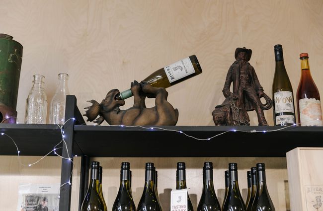 Moose statue drinking a bottle of wine River-T Estate in Kurow.