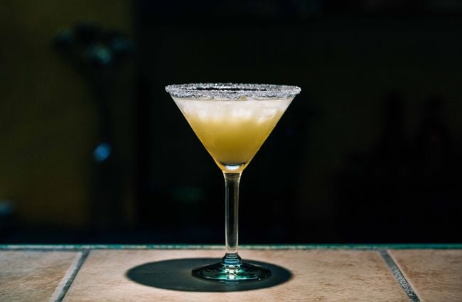 Close up of a cocktail on a table.