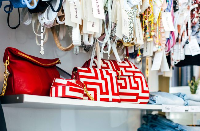 Red and white handbags on display at Sister on London.