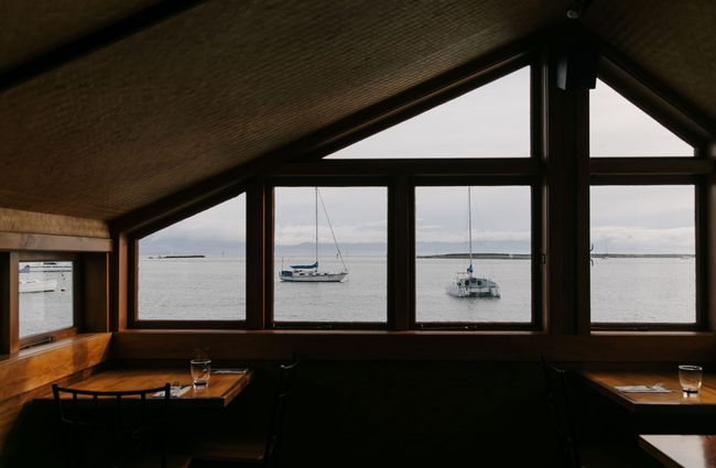View out to sailing boats at Boat Shed Cafe.