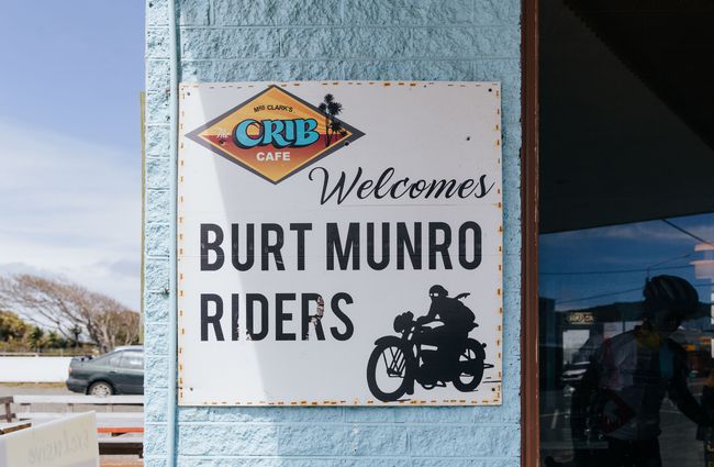 A burt munro sign on the exterior of the building.