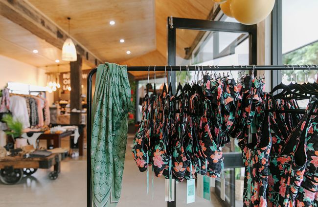A close up of floral swim wear on a rack at The Red Little Fox store in Fairlie.