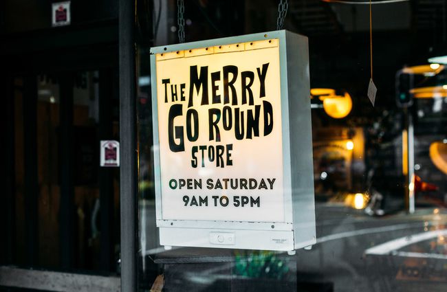The Merry Go Around window sign.