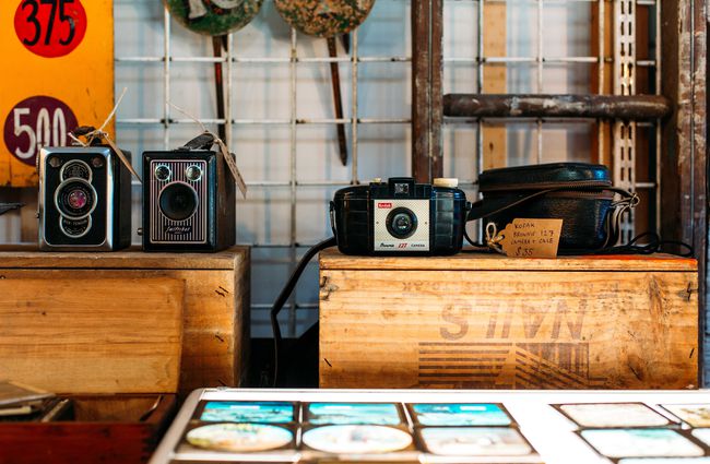 Collection of vintage cameras for sale at The Merry Go Around.