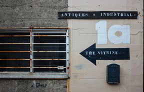 The shop sign.