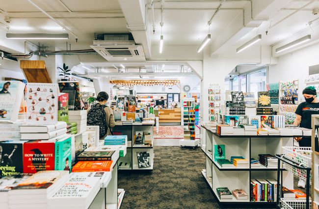 Interior space of the bookshop with customers at Vic Books', Wellington.