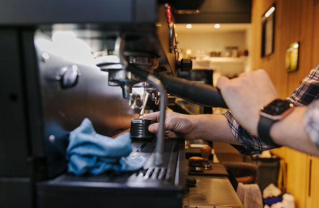 Espresso machine pouring a shot of coffee at Espresso245.
