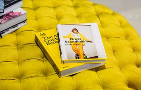 Yellow books on a yellow seat inside Wanda Harland Wakefield Street store in Wellington, New Zealand.