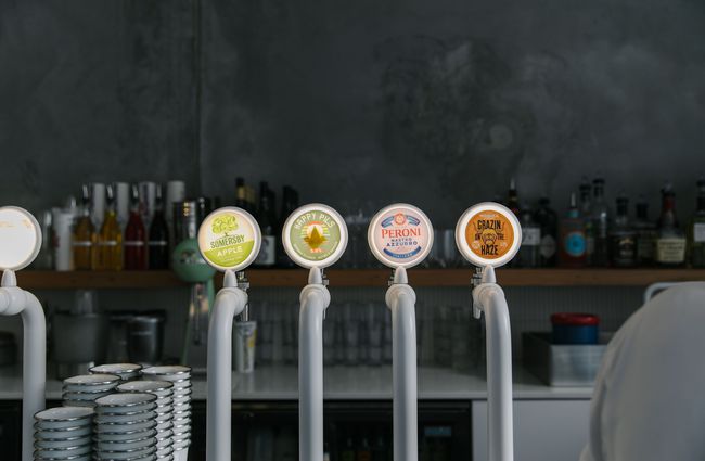 Close up of beer taps.