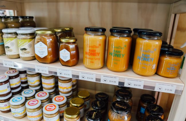 Jars of honey on the shelves.