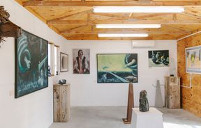 Art on the walls and sculptures on the floor inside York Street Gallery in Timaru.