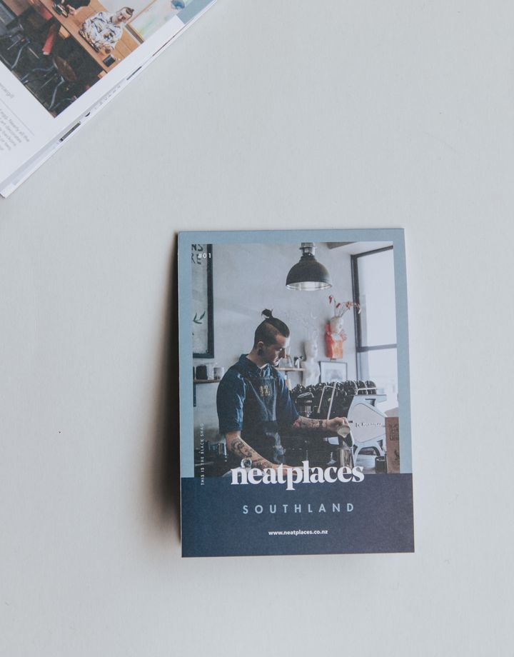 A photo of the front and back cover of the Neat Places Southland pocket guide.