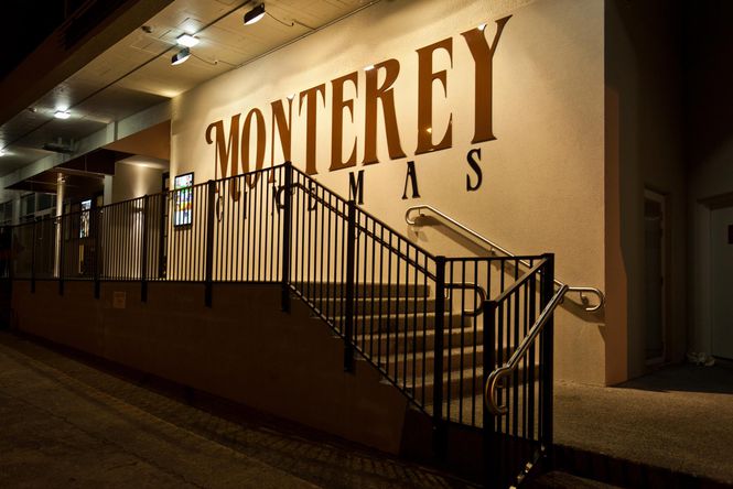 The entrance to Monterey Cinemas at night.